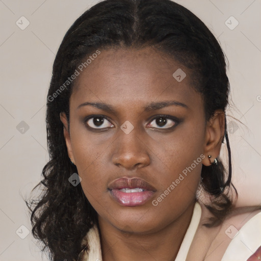 Neutral black young-adult female with medium  brown hair and brown eyes