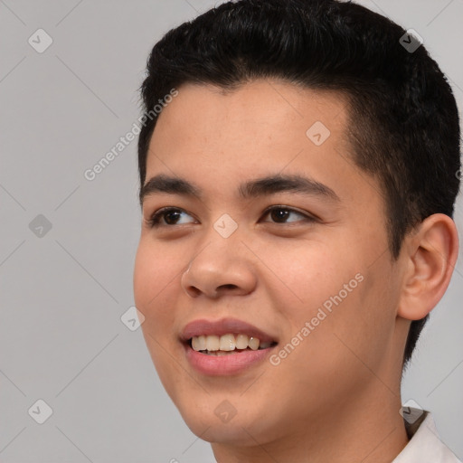 Joyful asian young-adult male with short  black hair and brown eyes