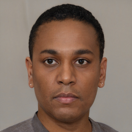 Neutral black young-adult male with short  black hair and brown eyes