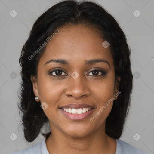 Joyful black young-adult female with medium  brown hair and brown eyes