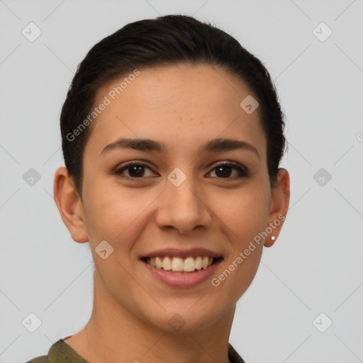 Joyful latino young-adult female with short  brown hair and brown eyes