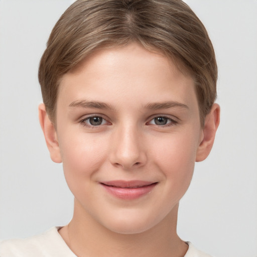 Joyful white child female with short  brown hair and brown eyes