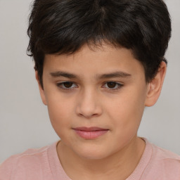 Joyful white child male with short  brown hair and brown eyes