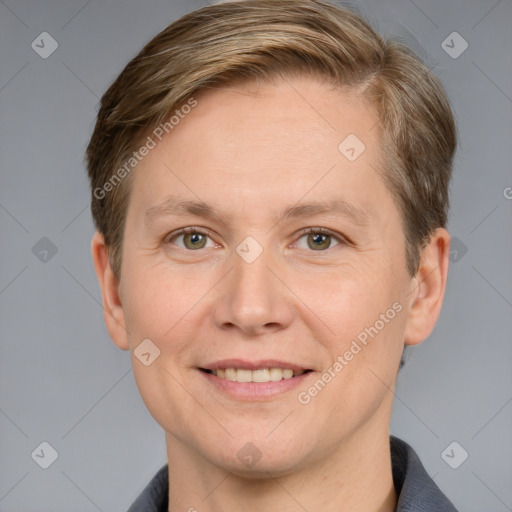 Joyful white adult female with short  brown hair and grey eyes