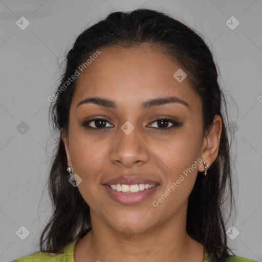 Joyful latino young-adult female with medium  brown hair and brown eyes