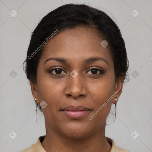 Joyful black young-adult female with medium  brown hair and brown eyes