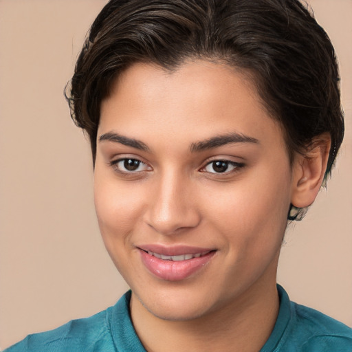 Joyful white young-adult female with short  brown hair and brown eyes