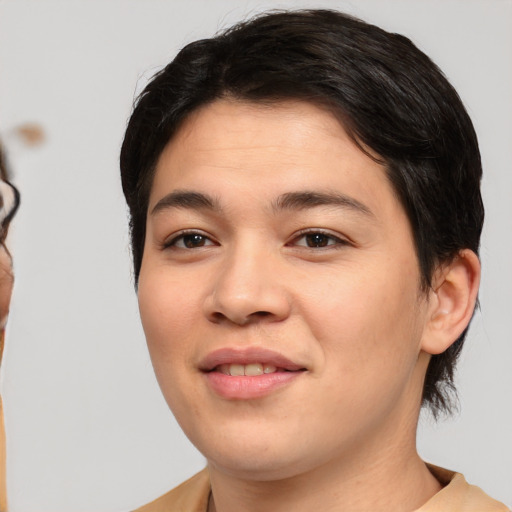 Joyful asian young-adult female with short  brown hair and brown eyes