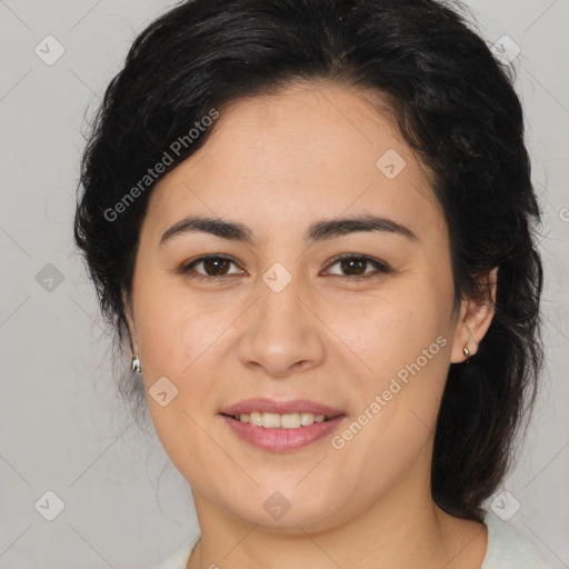 Joyful latino young-adult female with medium  brown hair and brown eyes