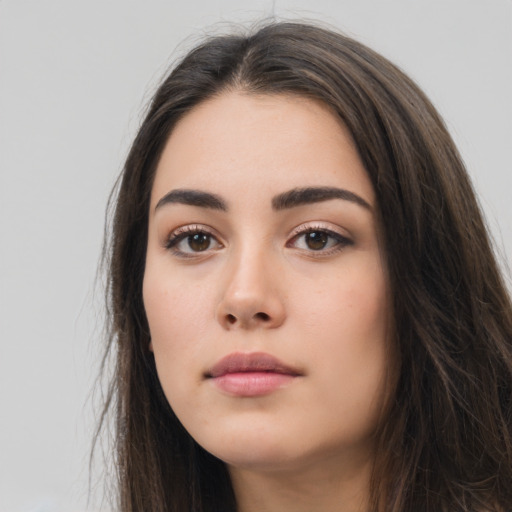 Neutral white young-adult female with long  brown hair and brown eyes