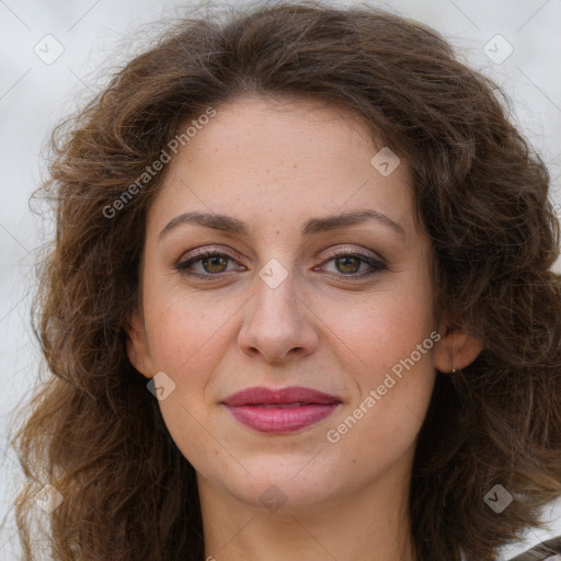 Joyful white adult female with long  brown hair and brown eyes