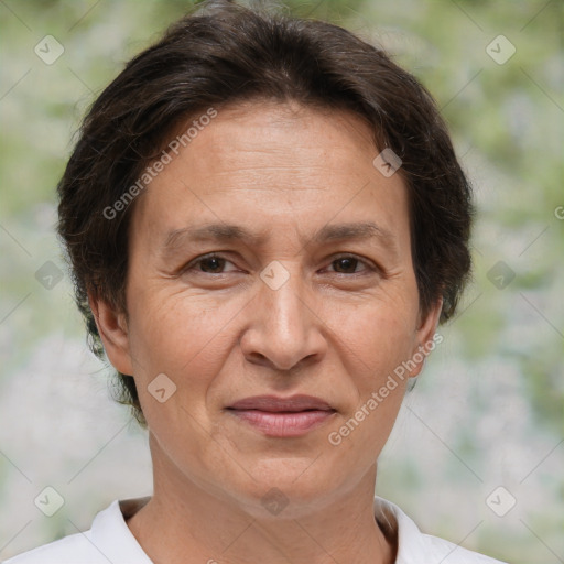 Joyful white adult female with short  brown hair and brown eyes