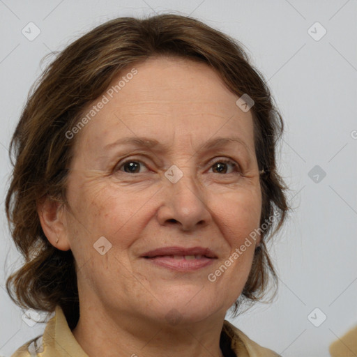 Joyful white middle-aged female with medium  brown hair and grey eyes