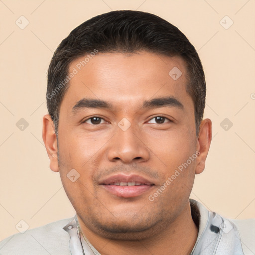 Joyful white young-adult male with short  black hair and brown eyes