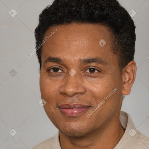 Joyful latino adult male with short  black hair and brown eyes