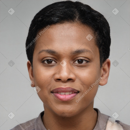 Joyful black young-adult female with short  black hair and brown eyes