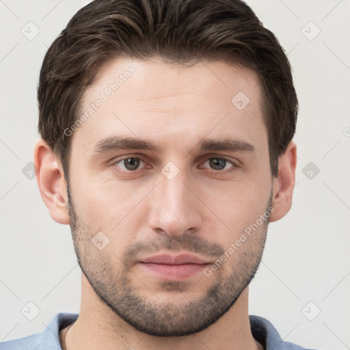 Neutral white young-adult male with short  brown hair and brown eyes