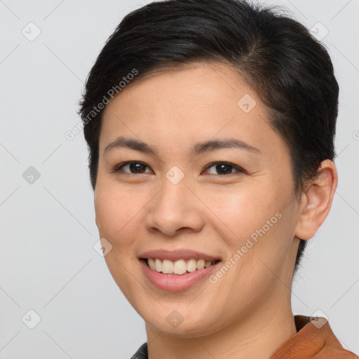 Joyful white young-adult female with short  brown hair and brown eyes