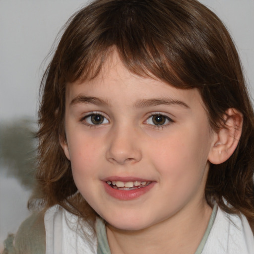 Joyful white child female with medium  brown hair and brown eyes