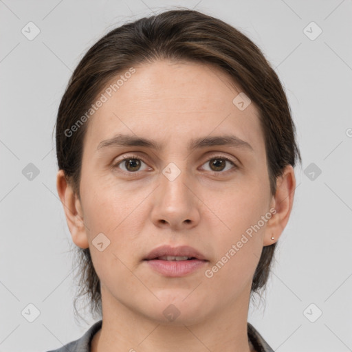 Neutral white young-adult female with medium  brown hair and brown eyes