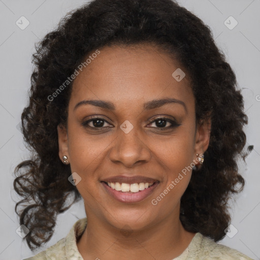 Joyful black young-adult female with medium  brown hair and brown eyes