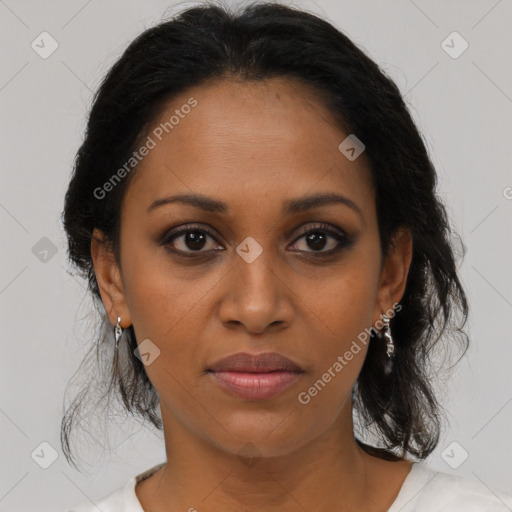 Joyful black young-adult female with medium  brown hair and brown eyes