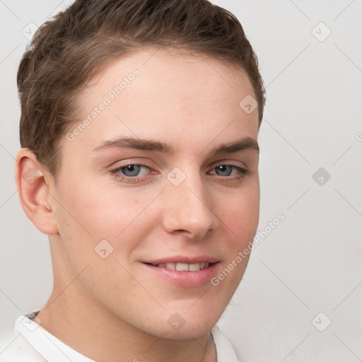 Joyful white young-adult female with short  brown hair and grey eyes