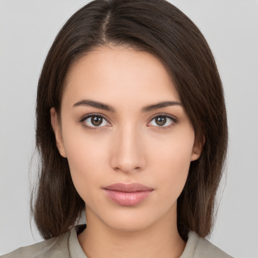 Neutral white young-adult female with medium  brown hair and brown eyes