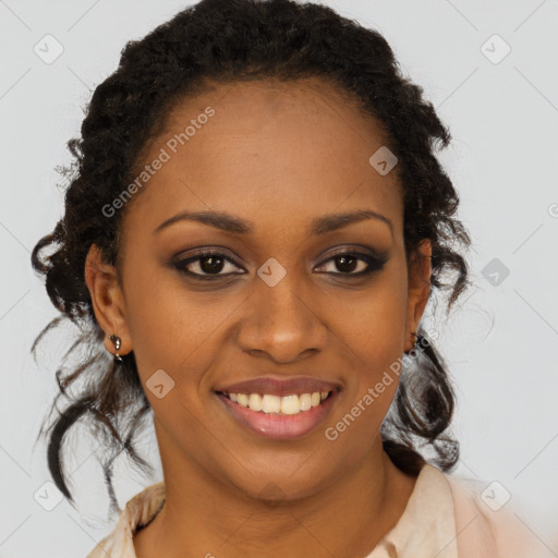 Joyful black young-adult female with long  brown hair and brown eyes