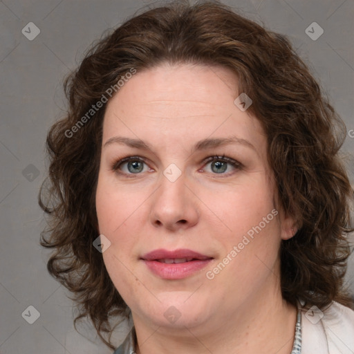 Joyful white young-adult female with medium  brown hair and green eyes