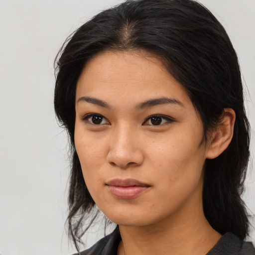 Neutral asian young-adult female with medium  black hair and brown eyes