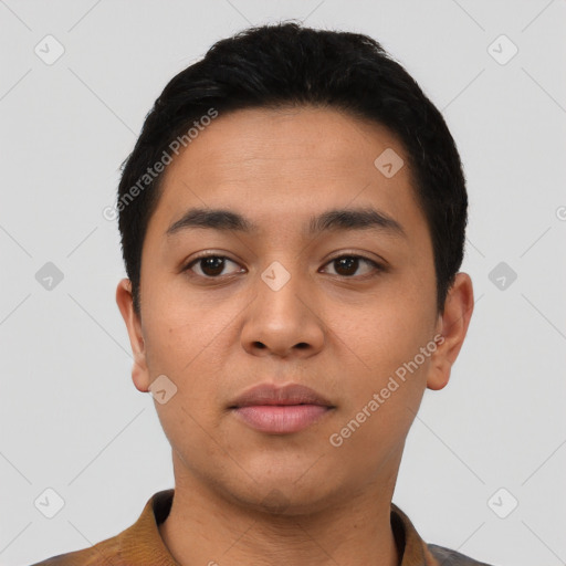 Neutral latino young-adult male with short  black hair and brown eyes