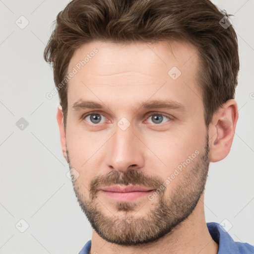 Neutral white young-adult male with short  brown hair and grey eyes