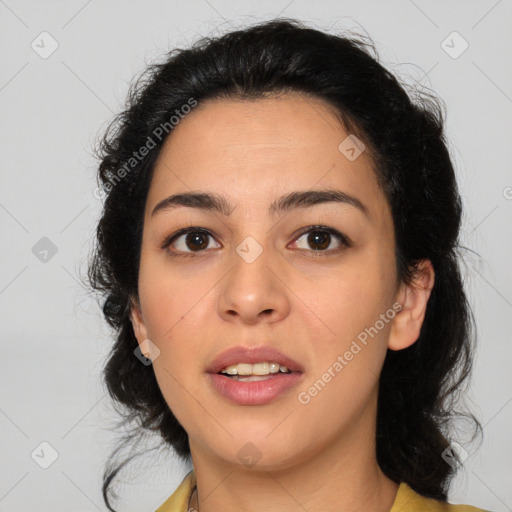 Joyful white young-adult female with medium  black hair and brown eyes