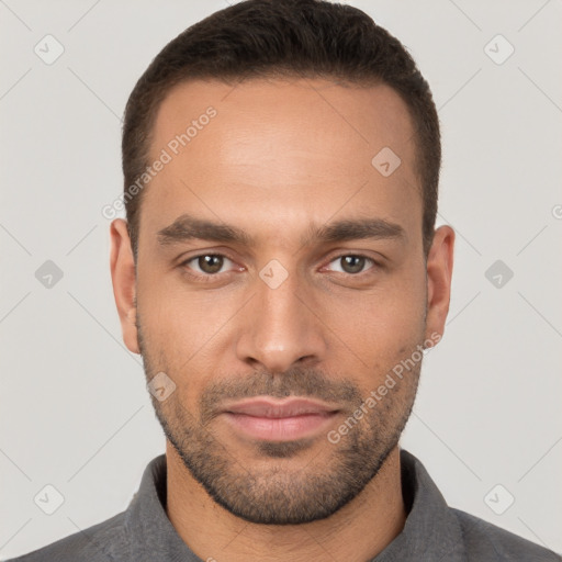 Neutral white young-adult male with short  brown hair and brown eyes