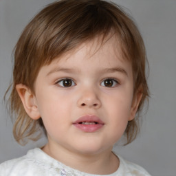 Joyful white child male with medium  brown hair and brown eyes