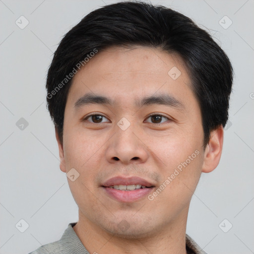 Joyful white young-adult male with short  black hair and brown eyes