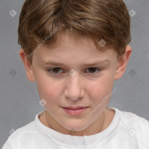 Joyful white child male with short  brown hair and brown eyes