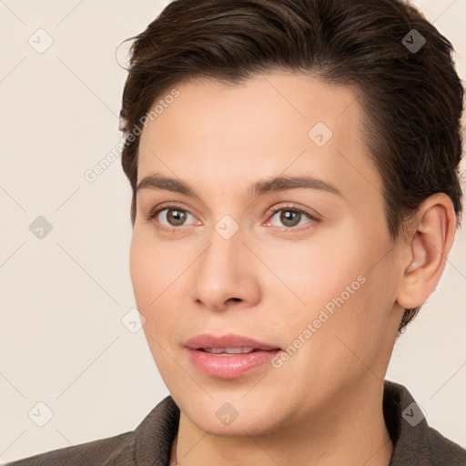 Joyful white young-adult female with short  brown hair and brown eyes