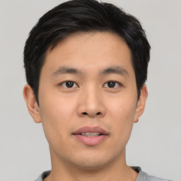 Neutral asian young-adult male with short  black hair and brown eyes