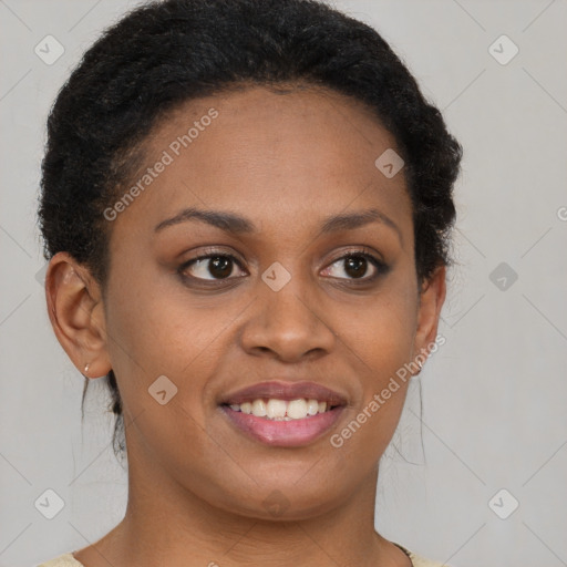 Joyful black young-adult female with short  brown hair and brown eyes