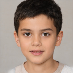 Joyful white child male with short  brown hair and brown eyes