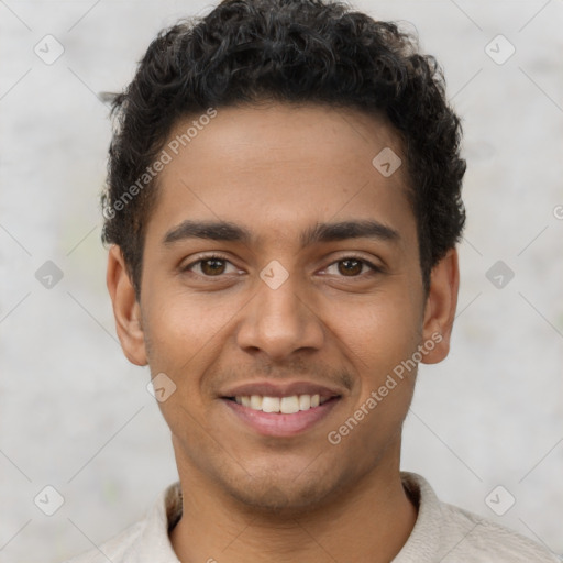 Joyful latino young-adult male with short  brown hair and brown eyes