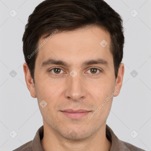 Joyful white young-adult male with short  brown hair and brown eyes