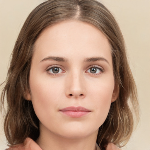 Neutral white young-adult female with medium  brown hair and green eyes