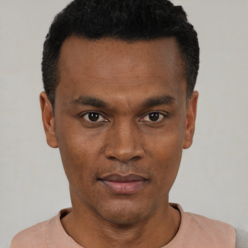 Neutral black young-adult male with short  black hair and brown eyes
