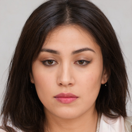 Neutral white young-adult female with long  brown hair and brown eyes