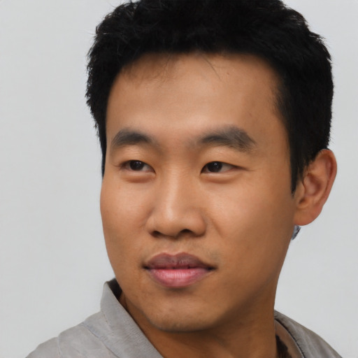 Neutral asian young-adult male with short  black hair and brown eyes