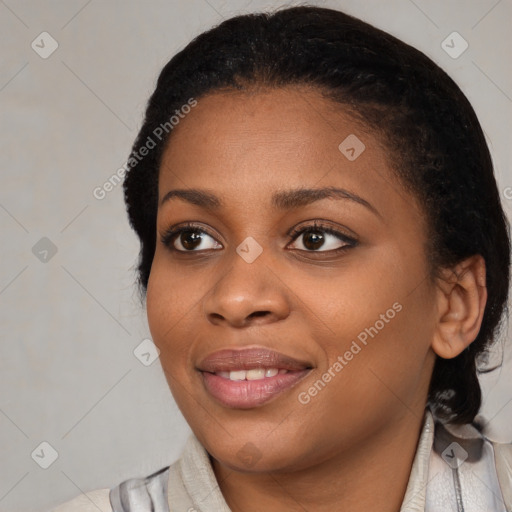 Joyful black young-adult female with medium  black hair and brown eyes