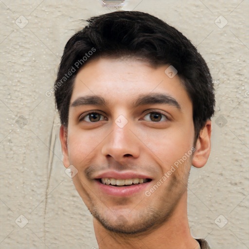 Joyful white young-adult male with short  black hair and brown eyes